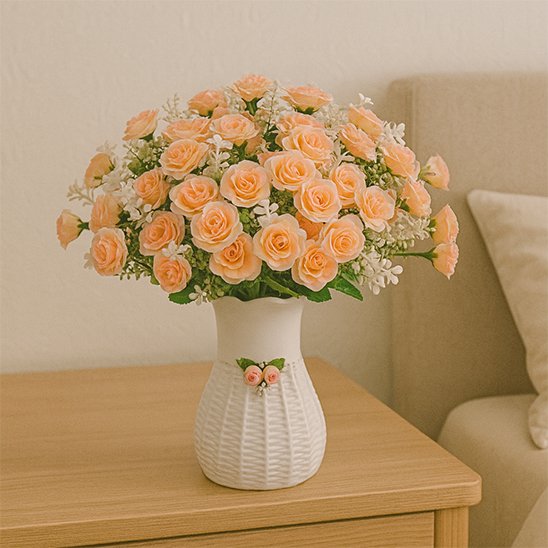 Plante artificielle rose Rose clair sur une table de coine du salon 