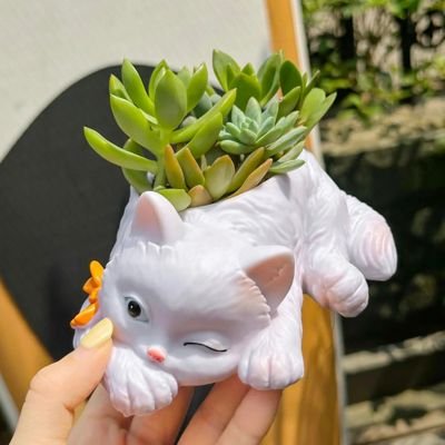 Pot de fleurs  en forme de chat couché