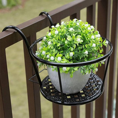 Support plante avec un pot de fleur dedans.